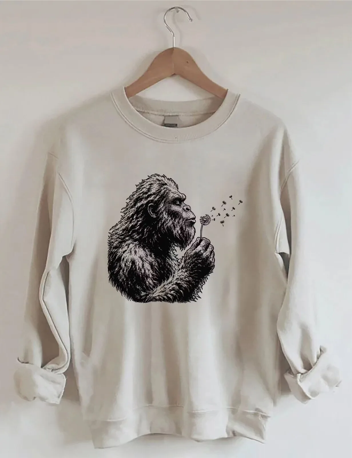Bigfoot Blowing Dandelion Seeds Sasquatch Nature Lover Sweatshirt 1 Bigfoot Blowing Dandelion Seeds Sasquatch Nature Lover Sweatshirt